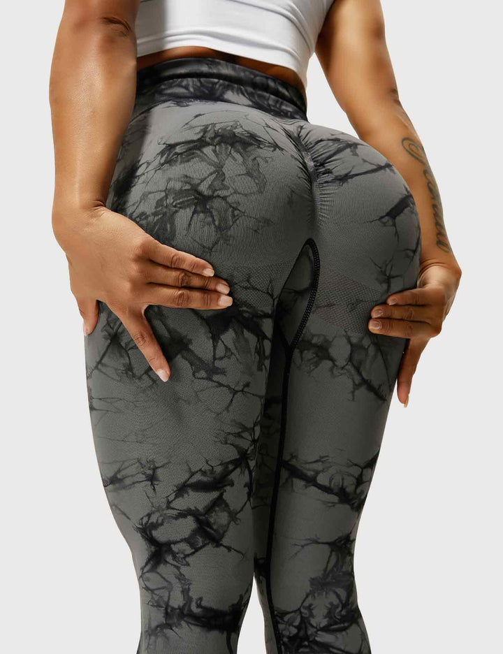Stylish women's tie-dye workout leggings, high waist design.