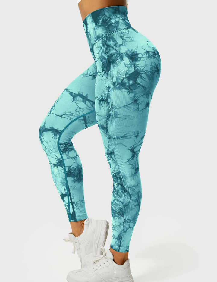Women's tie-dye running leggings, breathable & stylish.