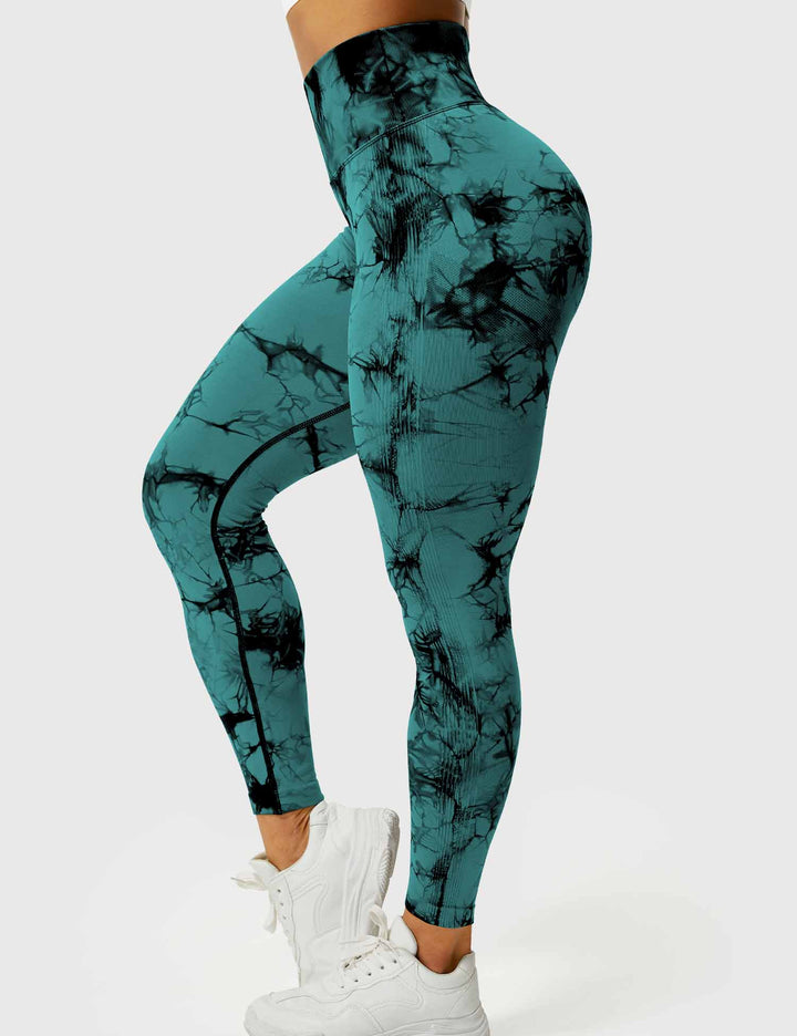 Compression tie-dye workout leggings for women, supportive.