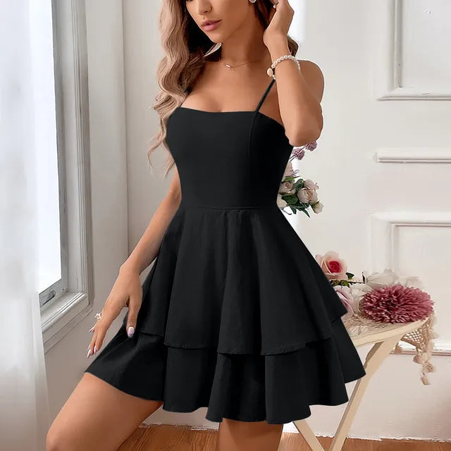 Women's tiered A-line mini homecoming dress with spaghetti straps, perfect for parties and cocktails.