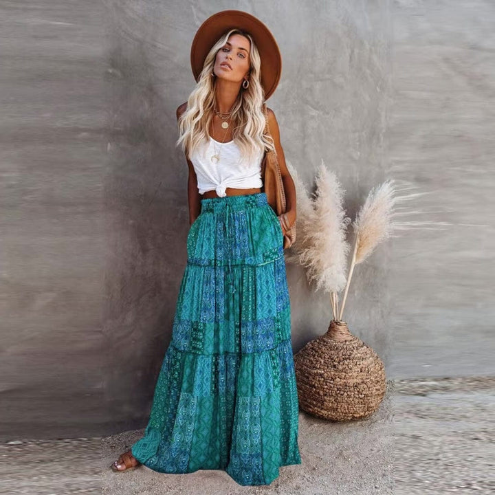 High waist elastic women's floral print long tiered skirt, comfortable & stylish for summer casual wear.