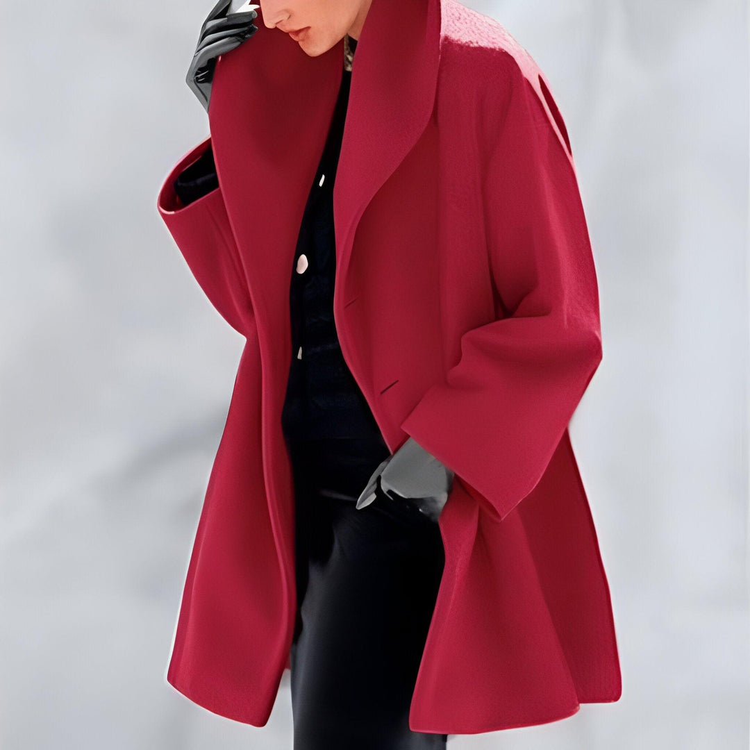 Women's timeless oversized long coat in a classic color, perfect for elegant fall and winter fashion.