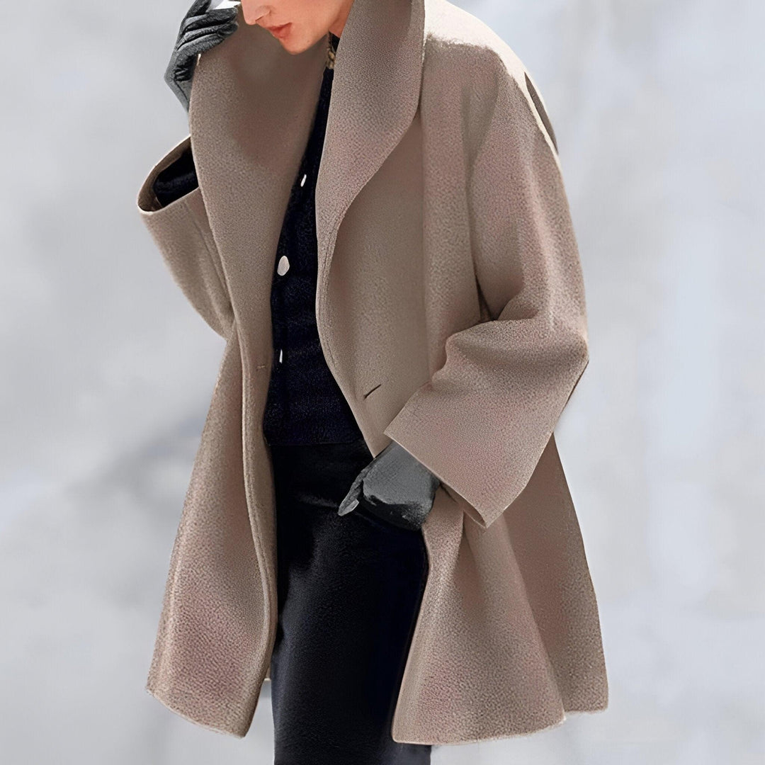 Comfortable women's long oversized coat, a timeless outerwear piece for chic winter and fall fashion.