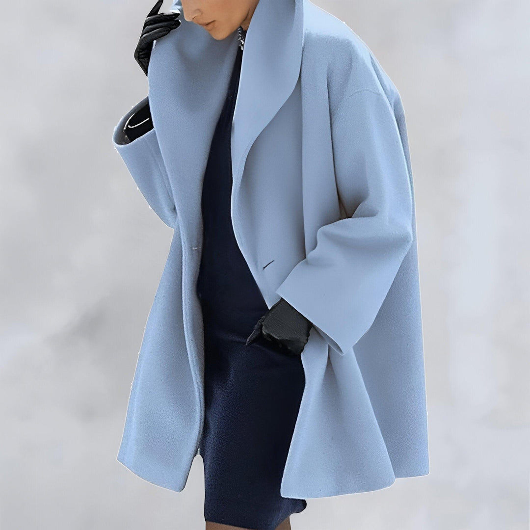 Classic women's oversized coat, a timeless and versatile outerwear staple for any stylish wardrobe.