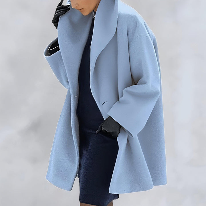 Classic women's oversized coat, a timeless and versatile outerwear staple for any stylish wardrobe.