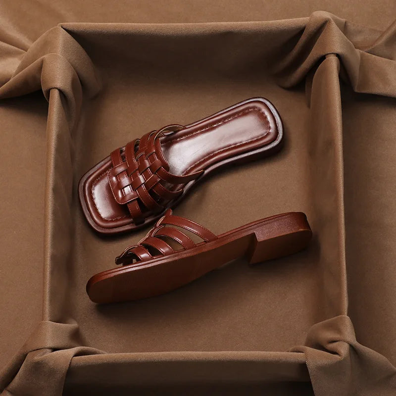 Comfortable women's slide sandals with Geo Cutout design, ideal for casual summer footwear and everyday wear.
