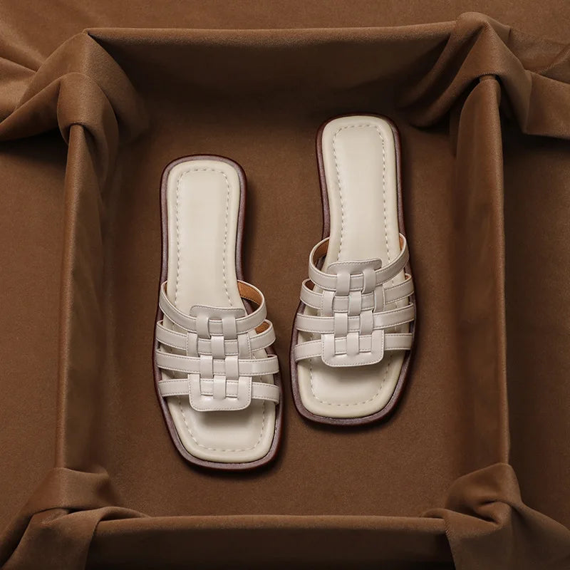 Brown women's Tivra Geo Cutout slide sandals, offering a stylish geometric design and cushioned comfort for summer.