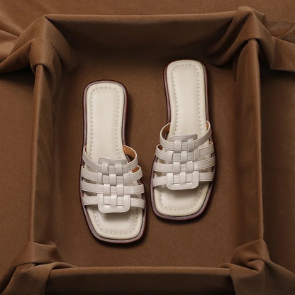 Brown women's Tivra Geo Cutout slide sandals, offering a stylish geometric design and cushioned comfort for summer.