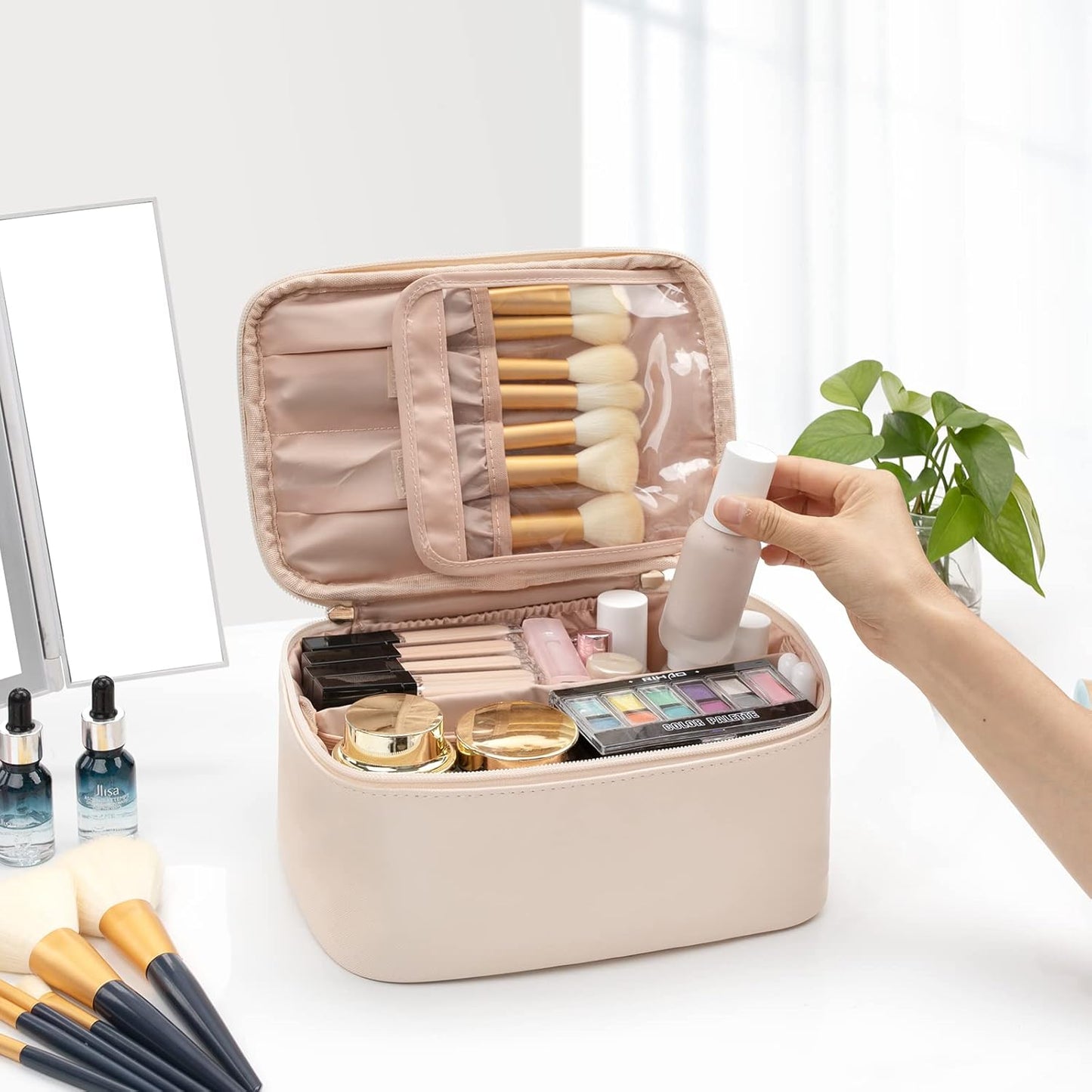 Women's travel vanity case, perfect for organizing makeup, brushes & skincare products on the go.
