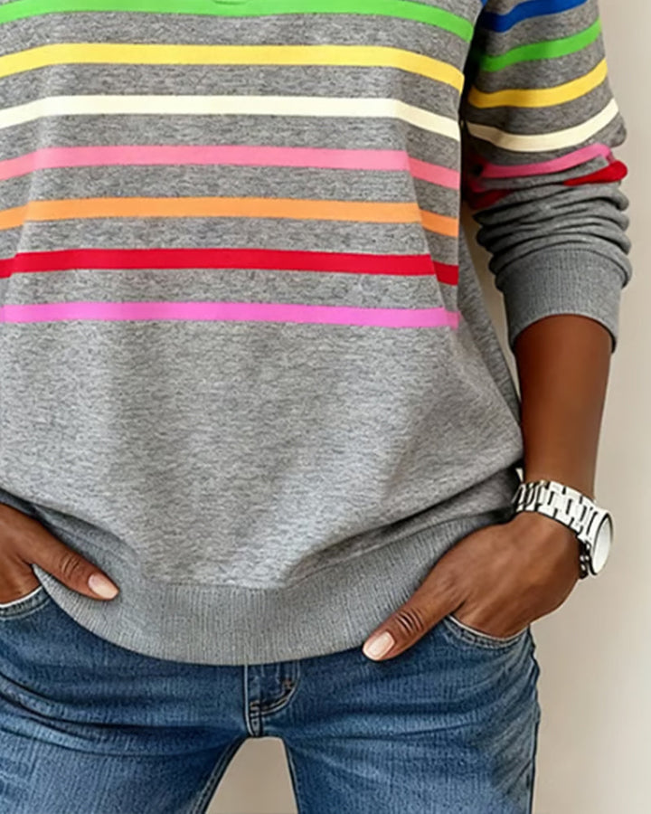 Comfortable women's colorful loose-fit top with a zipper neckline, great for everyday casual style.