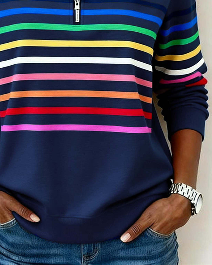 Vibrant women's colorful long-sleeve top with zipper, perfect for trendy, comfortable everyday outfits.