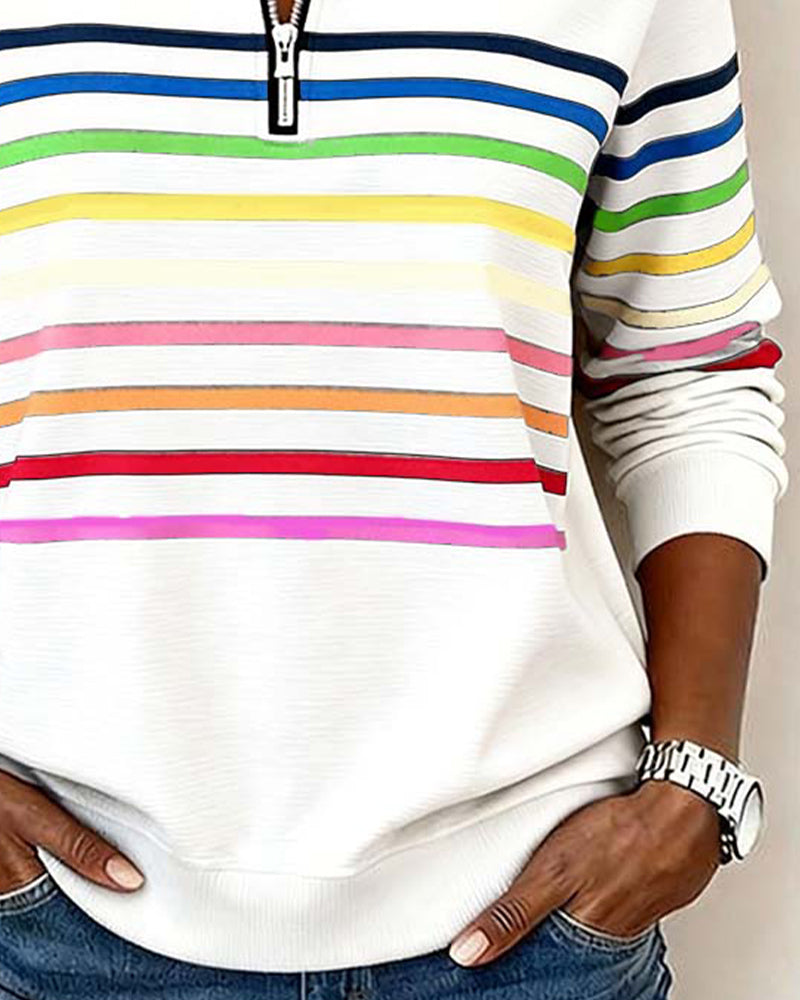Loose-fit women's colorful top with long sleeves & zipper, a vibrant and comfy choice for casual wear.