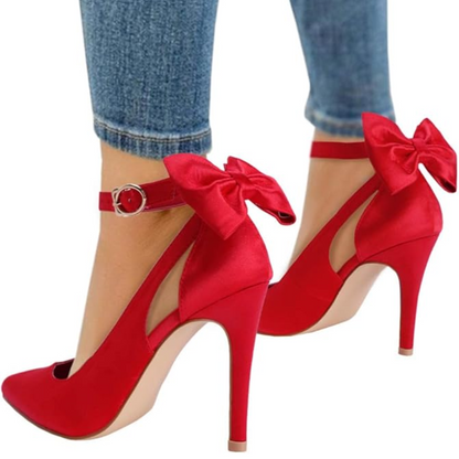 Elegant Hailey pump heels for women, with a sophisticated bow, pointed toe, and adjustable ankle strap.