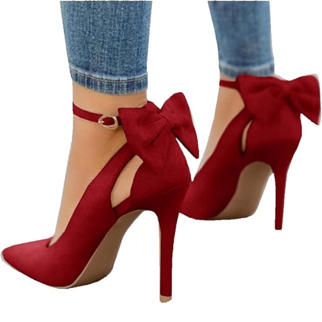 Trendy women's evening shoes: high heels with a delicate bow, pointed toe, and slender ankle strap.