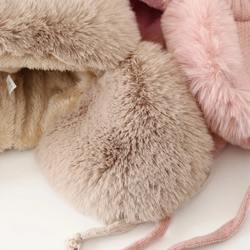 Women's earflap winter hat. Snug fit & maximum warmth for cold outdoor activities and winter sports.