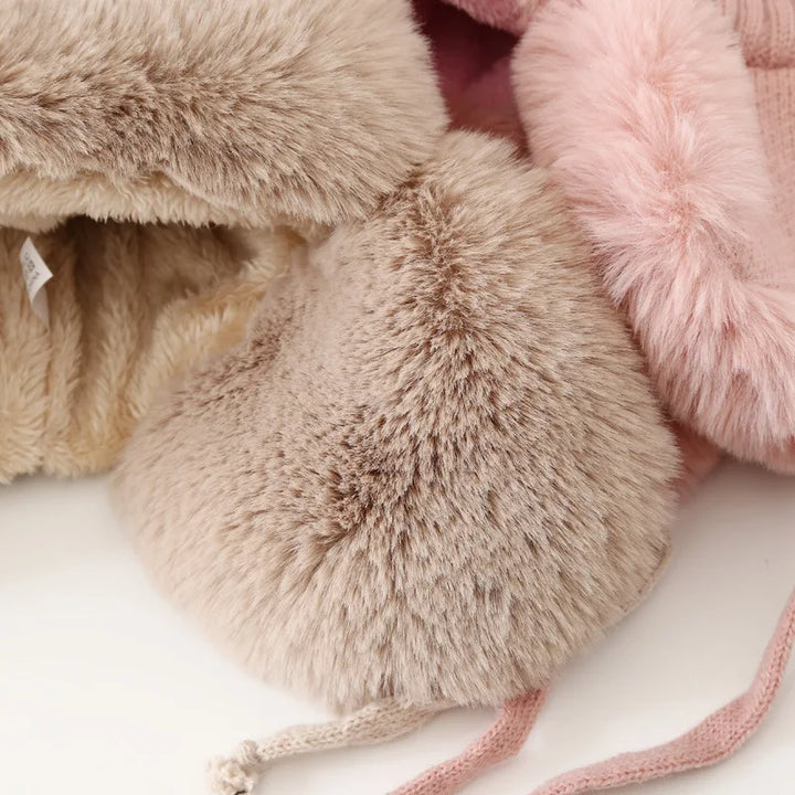 Women's earflap winter hat. Snug fit & maximum warmth for cold outdoor activities and winter sports.