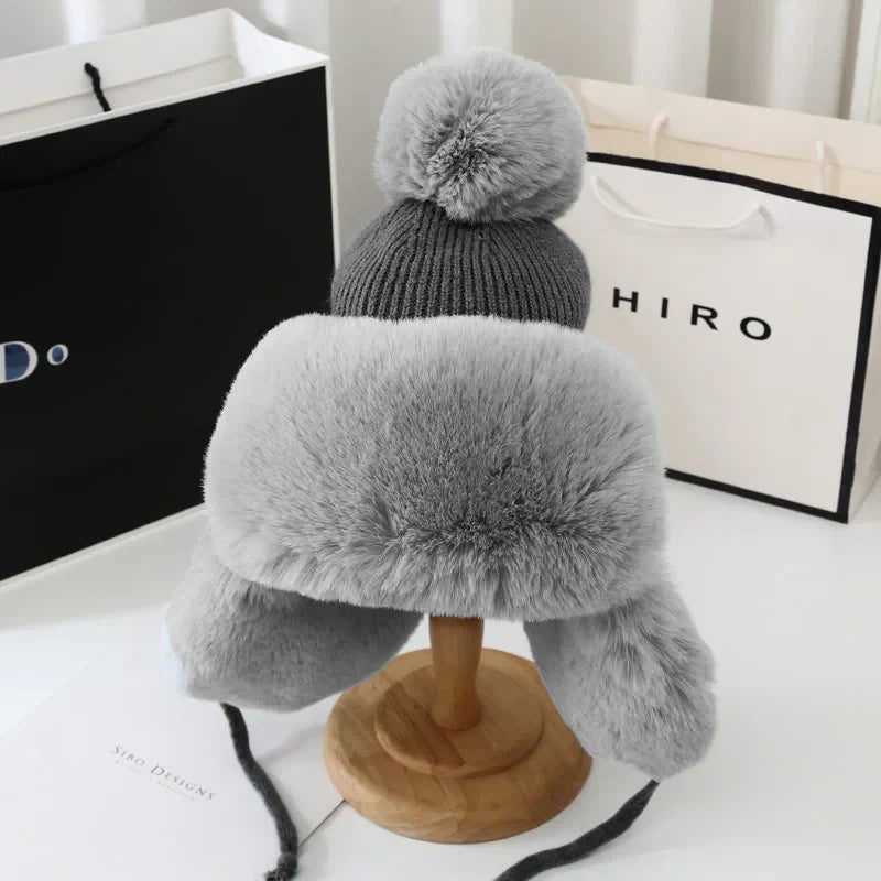 Stylish women's earflap ski hat. Essential winter headwear for warmth, fashion & outdoor adventures.