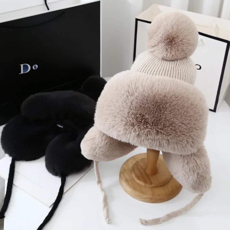 Stay warm with this women's Winter Shield earflap hat. Essential cold weather & snow headwear.