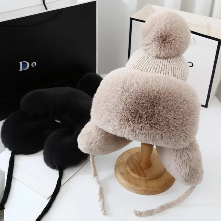 Stay warm with this women's Winter Shield earflap hat. Essential cold weather & snow headwear.