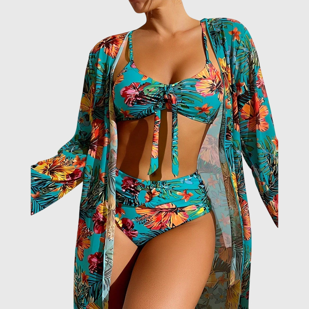Stylish woman in a tropical print bikini, enjoying summer beachwear and poolside fashion.