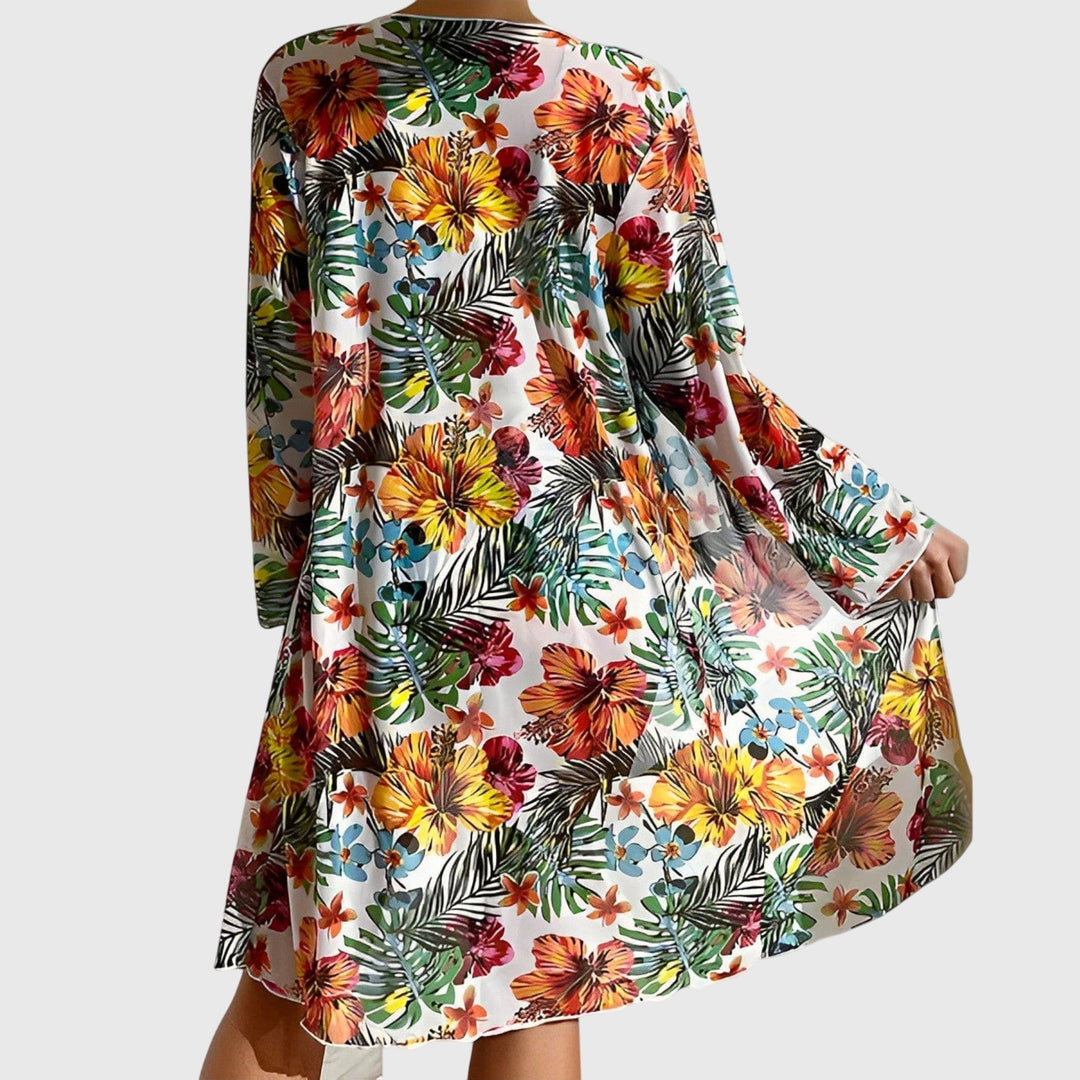 Elegant tropical print two-piece bikini swimsuit set, essential women's summer beachwear.