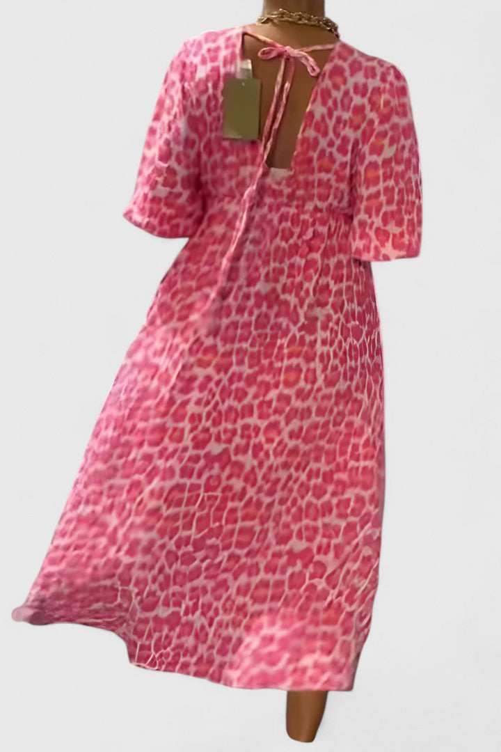 Women's casual tropical stripe maxi dress with puff sleeves, V-neck, & flowing design, great for resort vacations.