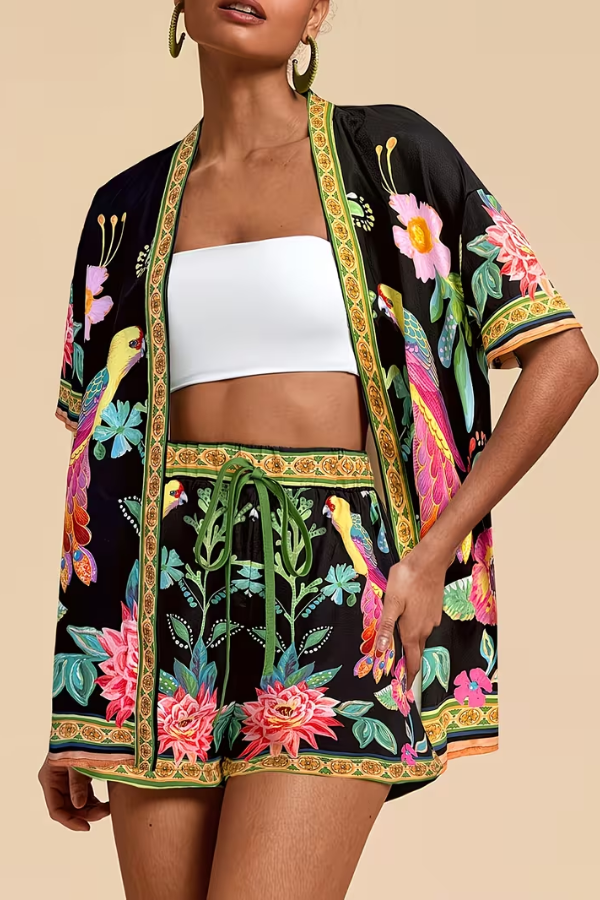 Stylish women's tropical floral print two-piece summer fashion set, perfect for casual or vacation wear.