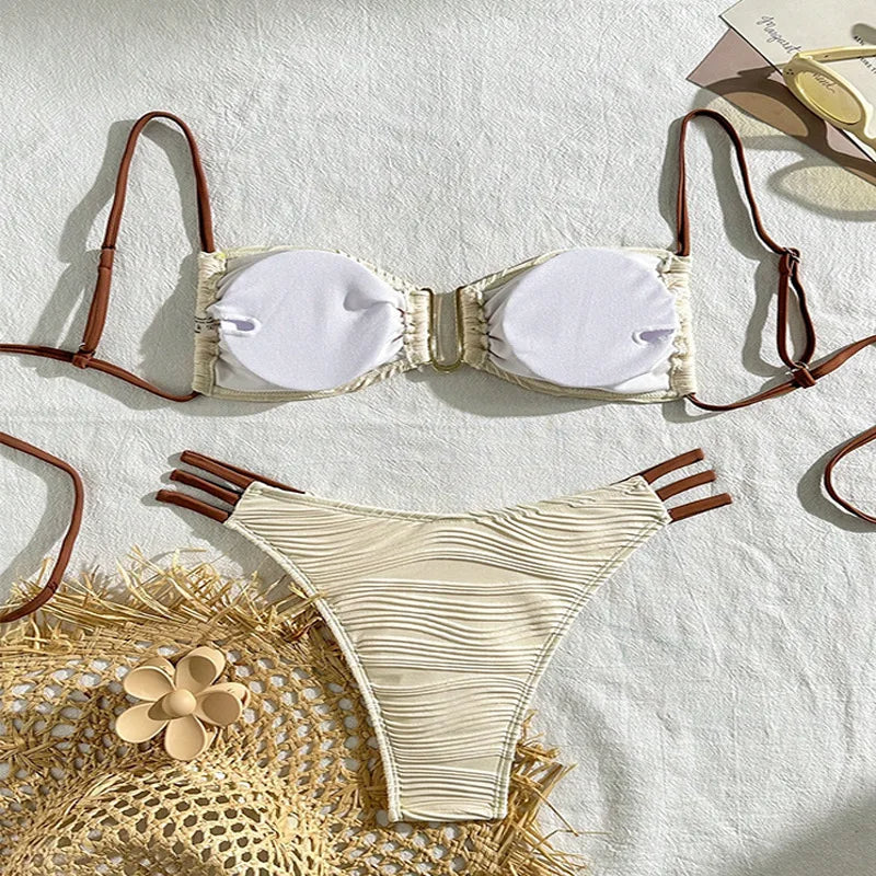 Detailed view of the ruched bandeau bikini top from the women's Tulum swimsuit set.