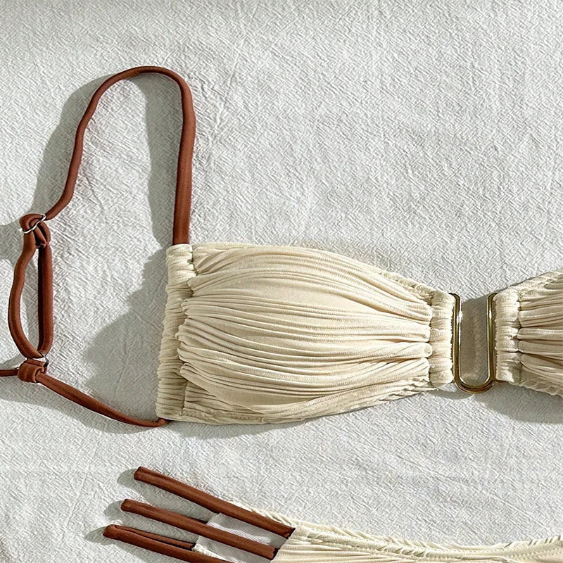 Women's boho bandeau bikini set, Tulum style with ruched details for ultimate beach fashion.