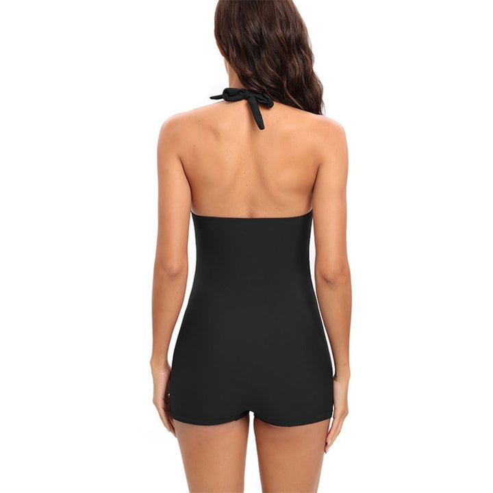 Athletic women's one-piece swimsuit, featuring tummy control and boyshort design for active wear.