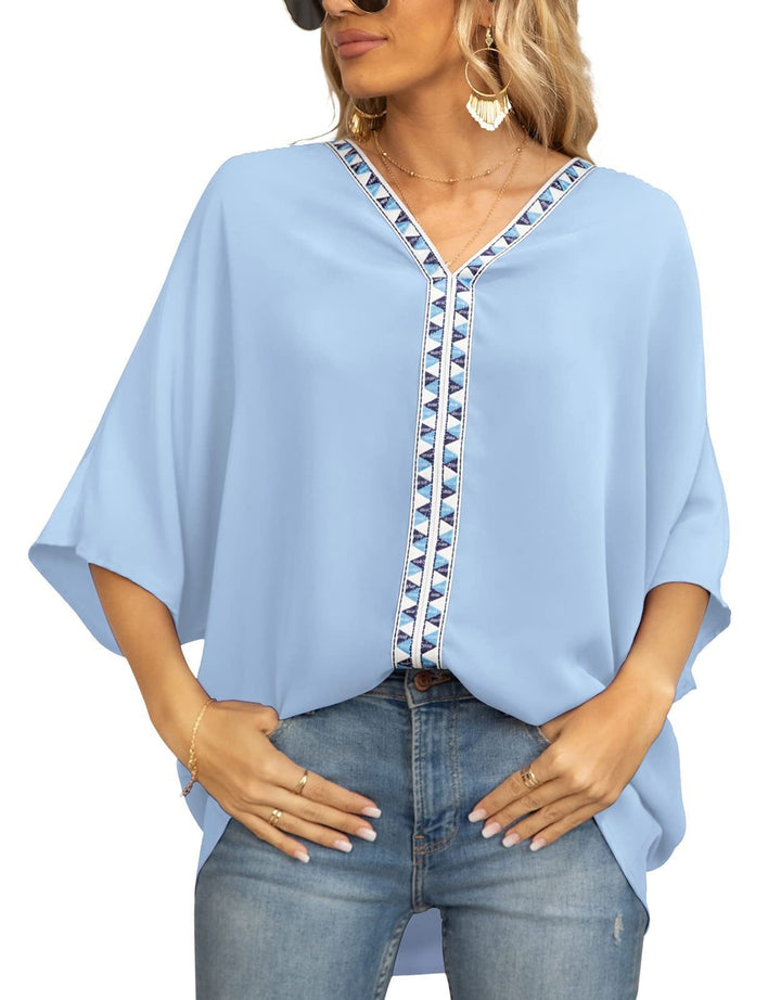 Women's half sleeve tunic top, geometric V-neck. Relaxed fit for casual wear and effortless comfort.