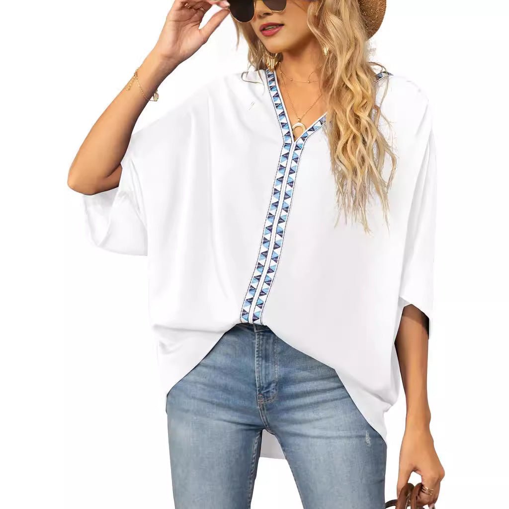Comfortable women's top: geometric V-neck, half sleeve, relaxed fit tunic. Great for casual summer.