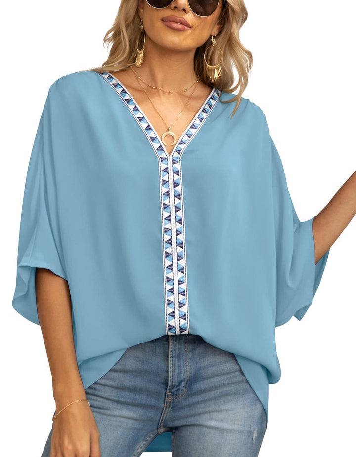 Women's casual tunic with geometric V-neck, half sleeve. Relaxed fit blouse for boho spring fashion.