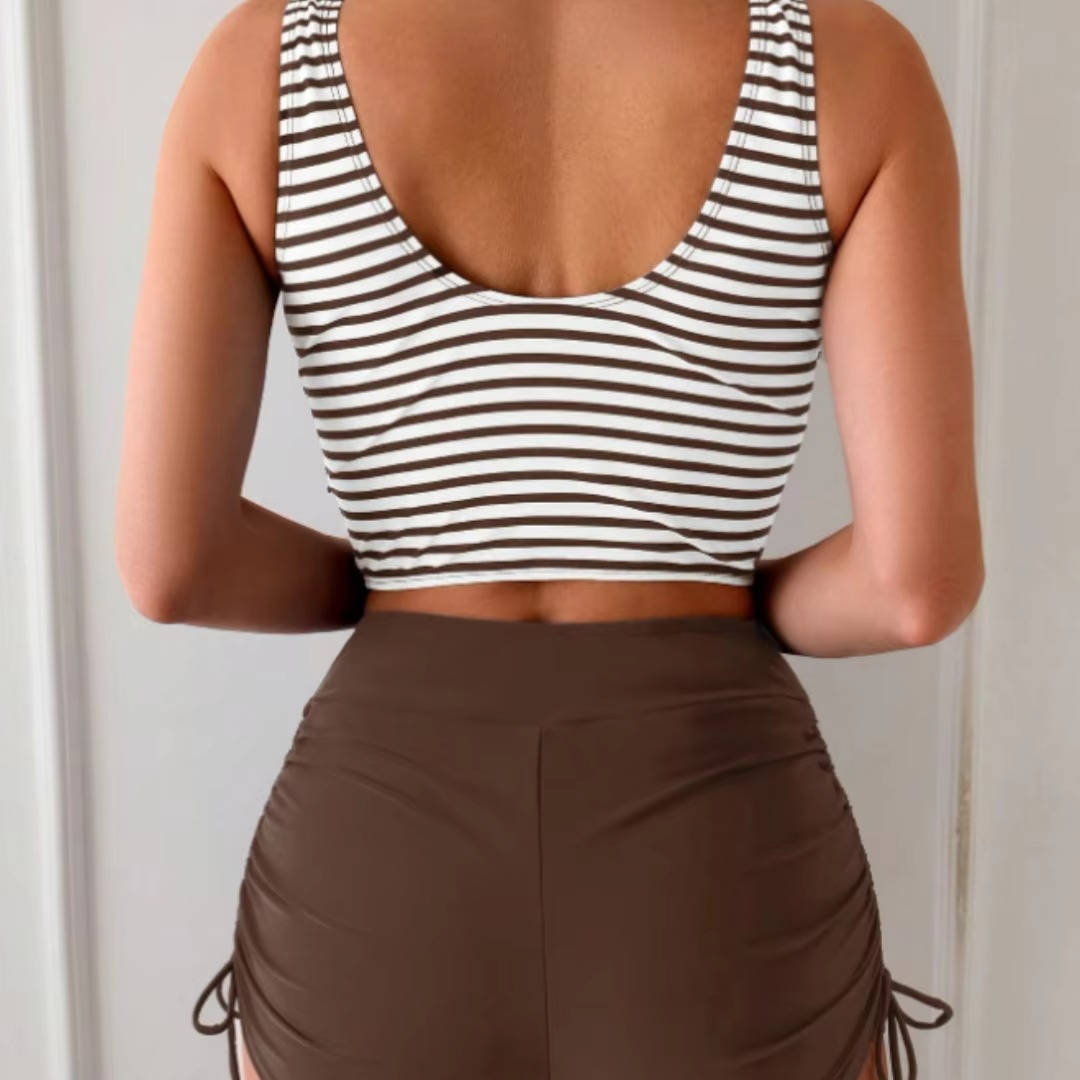 Women's twist front high waisted tankini swimsuit, a stylish bathing suit for beach days & poolside.