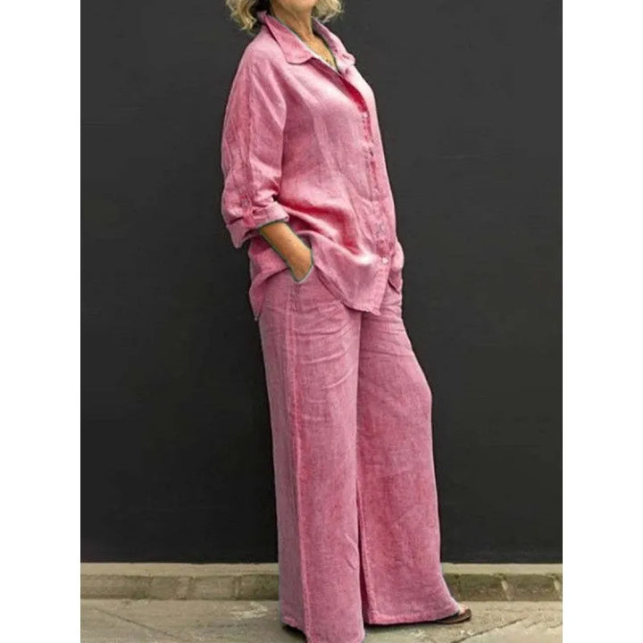 Chic women's two-piece button-up shirt and wide-leg pants set, a versatile coordinated outfit for women.