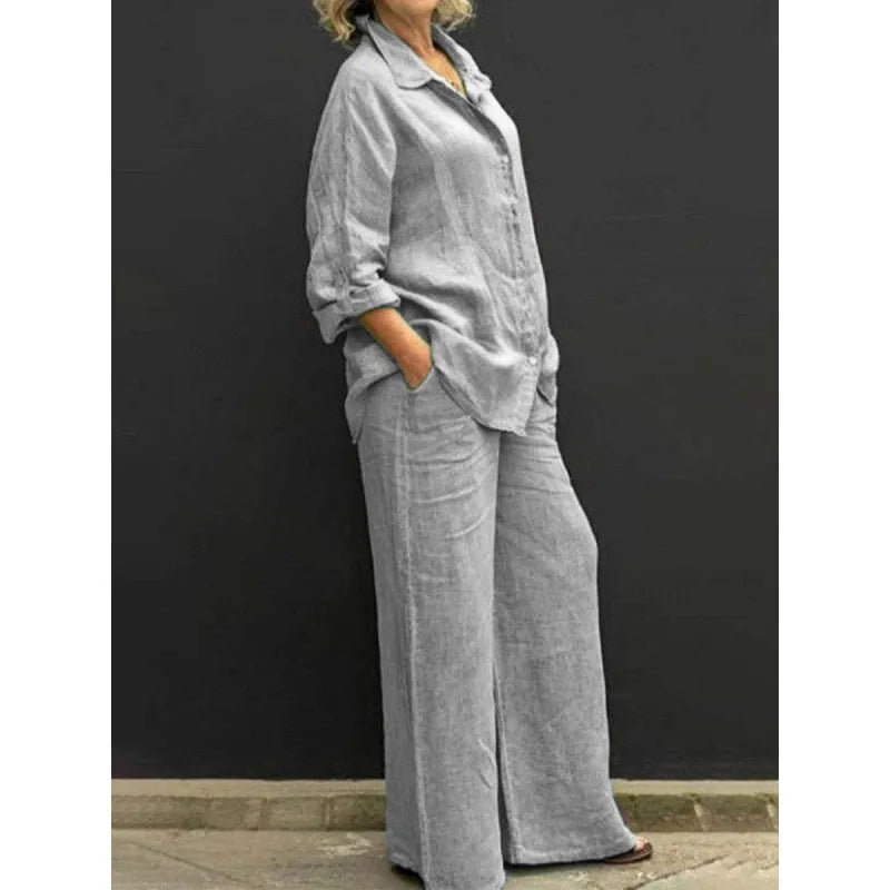 Elegant women's coordinated two-piece set featuring a button-up shirt and comfortable wide-leg pants.