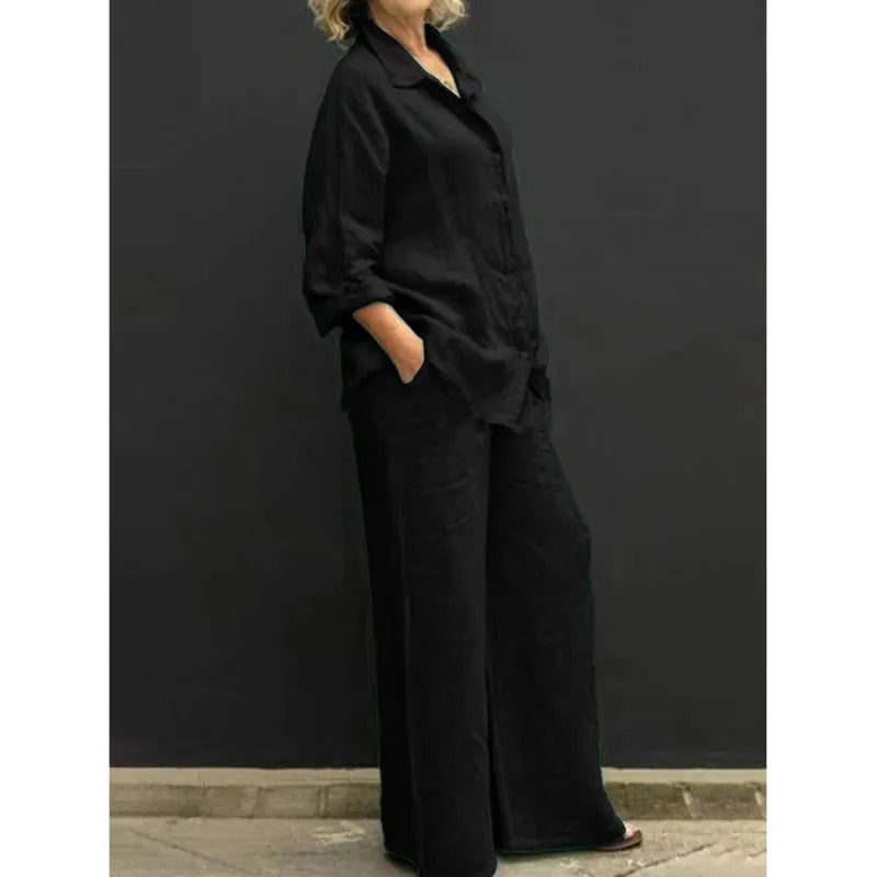 Relaxed fit women's two-piece set: a button-up top paired with comfortable, flowy wide-leg pants.