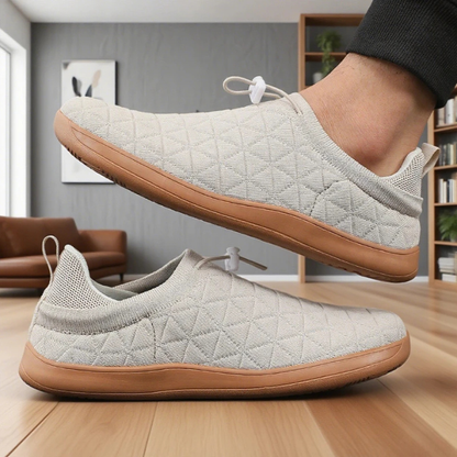 Side view: Women's ultra-comfort mesh slip-on sneakers with a flexible, cushioned sole for walking.