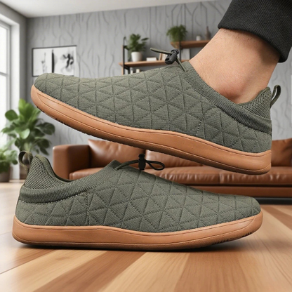 Close-up of breathable mesh texture on women's slip-on comfort sneakers. Cozy, lightweight & flexible.