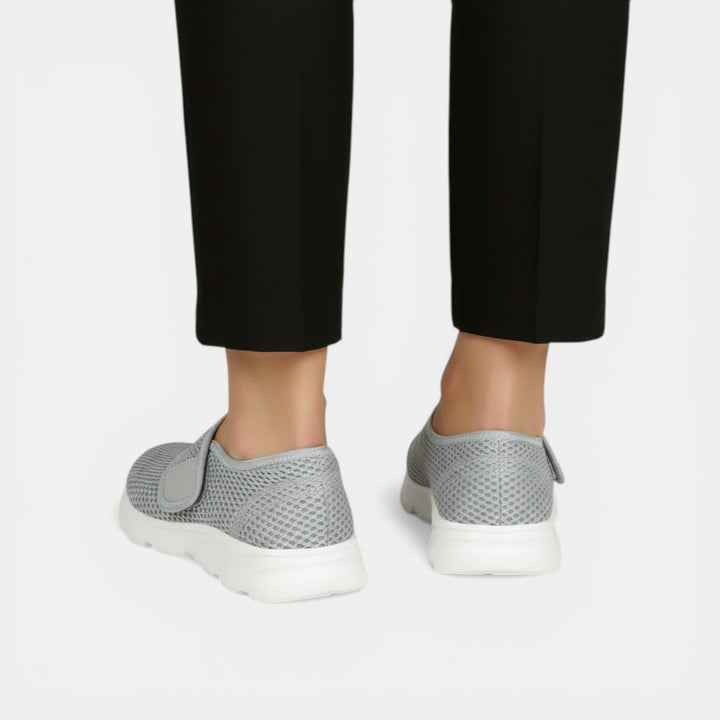 Ergonomic women's orthopedic shoes. Breathable walking sneakers with superior foot support.