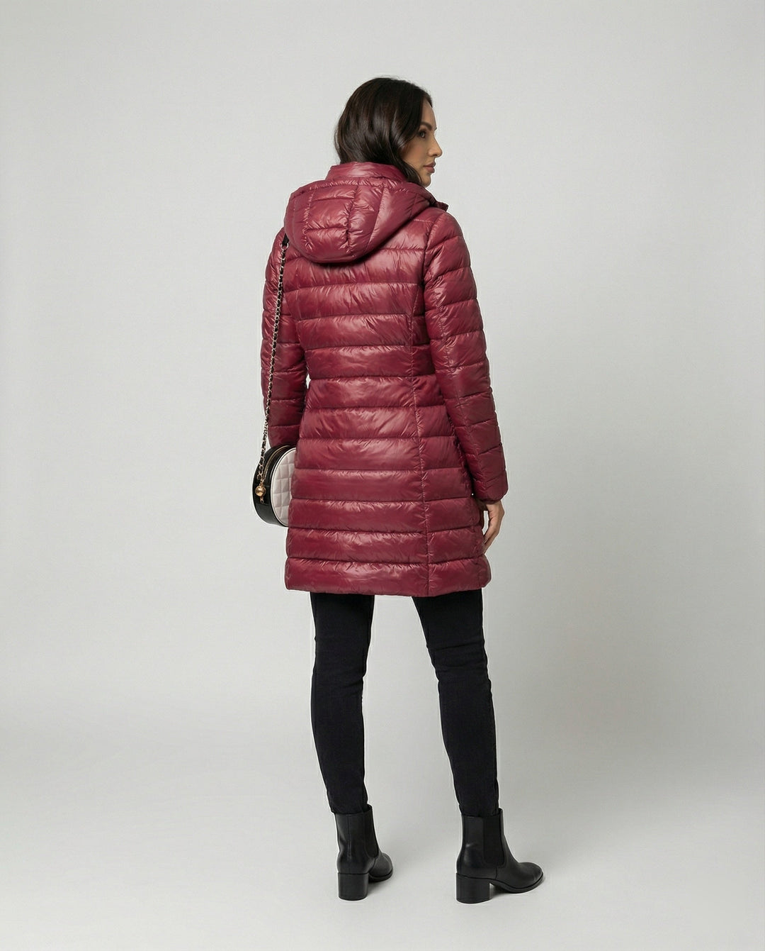 Lightweight women's outerwear, an insulated hooded jacket perfect for fall and spring.