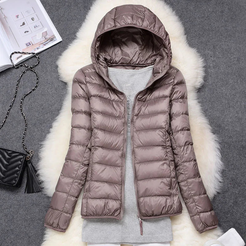 Women's ultralight insulated hooded jacket, perfect for fall & winter warmth.