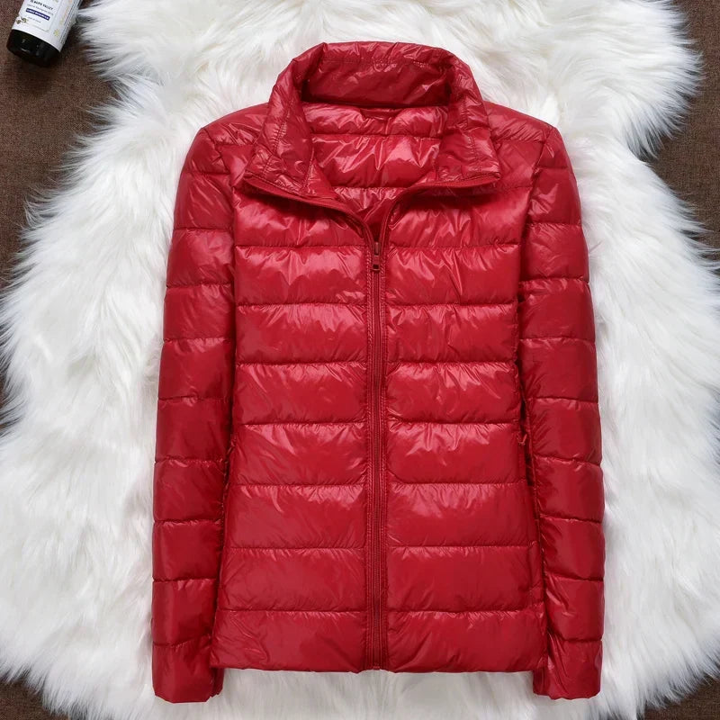 Women's fall fashion insulated jacket, a stylish & lightweight hooded option.