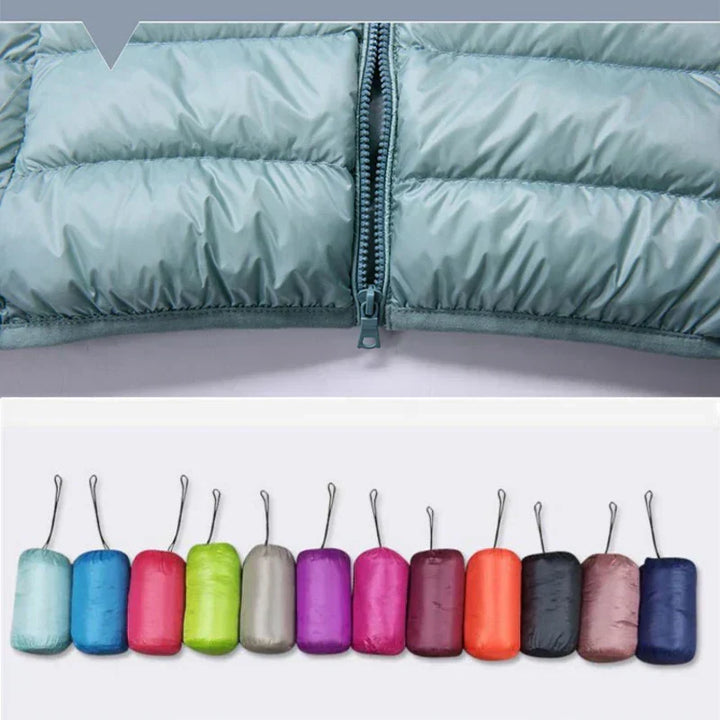 Women's versatile ultralight hooded jacket, offering packable warmth & style.