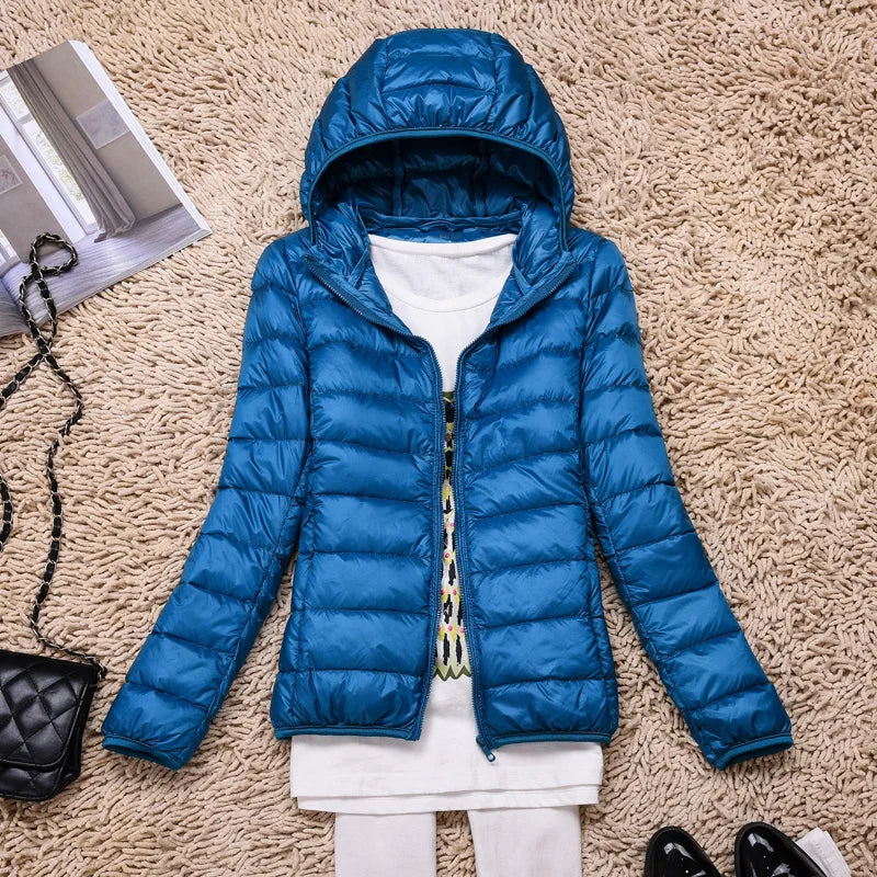 Stylish women's ultralight winter coat, hooded & insulated for ultimate warmth.