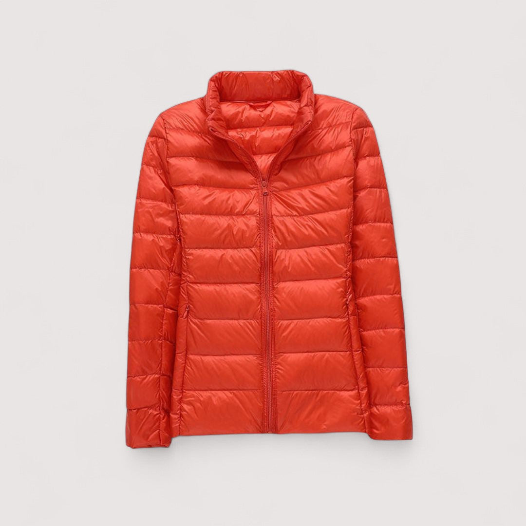 Women's ultralight cold weather jacket, stylish and warm, ideal for winter travel.