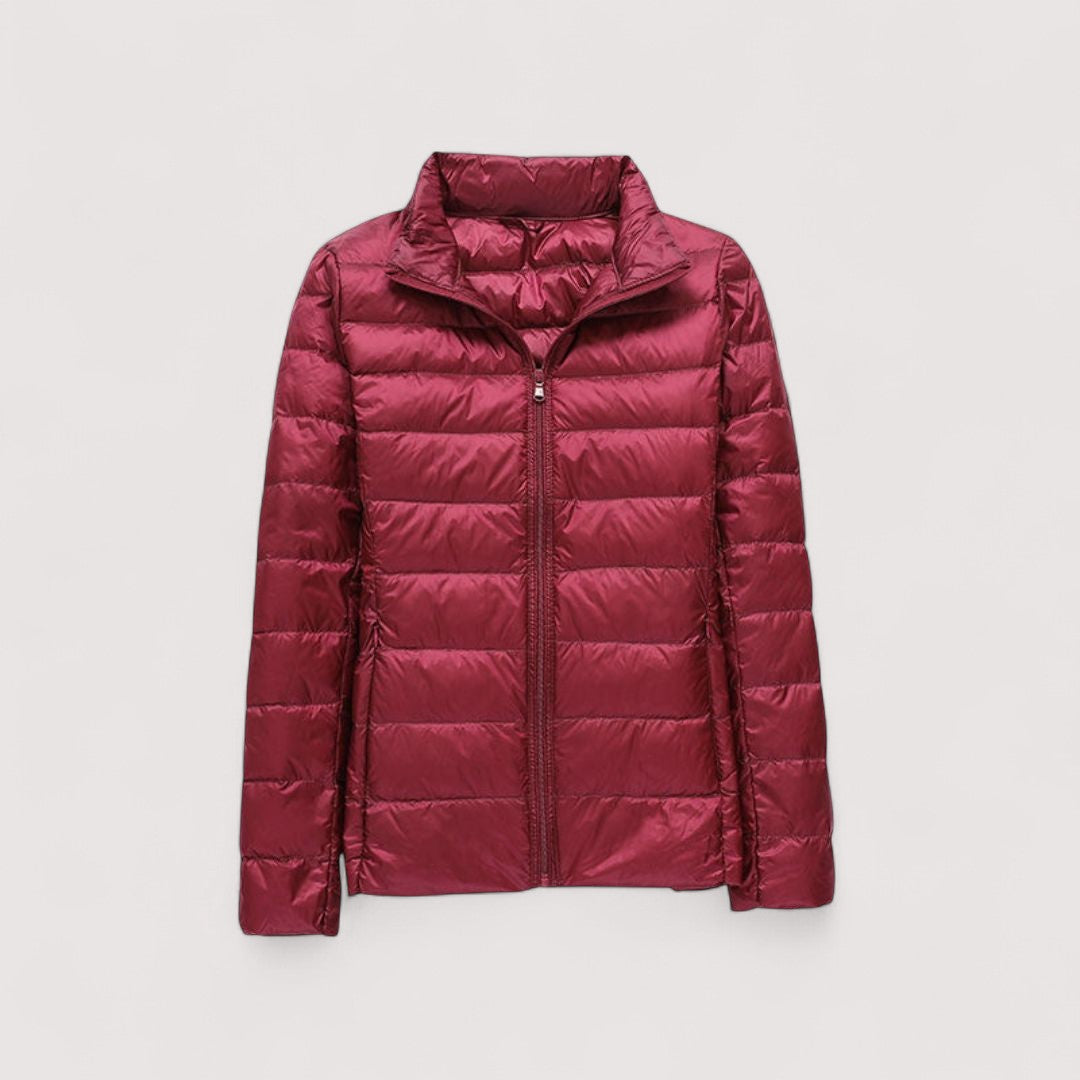 Cozy women's puffer jacket, insulated and ultralight for superior winter warmth.