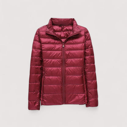 Cozy women's puffer jacket, insulated and ultralight for superior winter warmth.