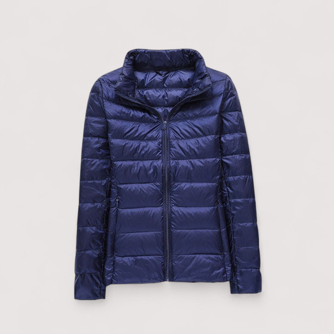 Lightweight women's puffer jacket, chic & warm outerwear for elegant winter fashion.