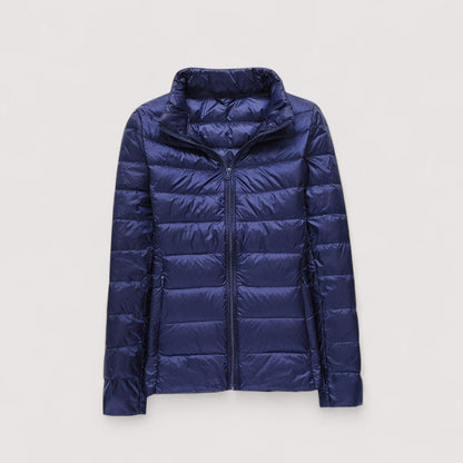 Lightweight women's puffer jacket, chic & warm outerwear for elegant winter fashion.